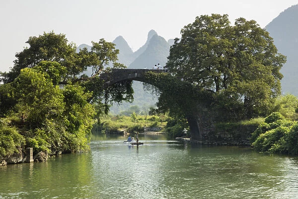 Fuli Bridge and Karst limestone peaks byond, Yangshou, GuangxiYangshuo, China