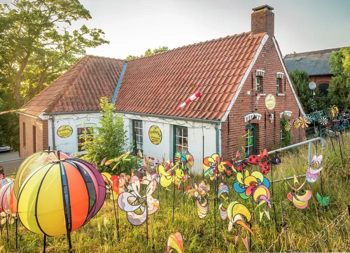Framed Print : Funny colorful wind chimes at the dike house in Greetsiel, East Frisia, Lower Saxony, Germany Framed Print : Funny colorful wind chimes at the dike house in Greetsiel, East Frisia, Lower Saxony, Germany