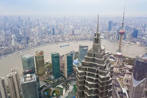 Futuristic Jinmao Tower overlooking the Huangpu river, Bund and Shanghai City, Shanghai