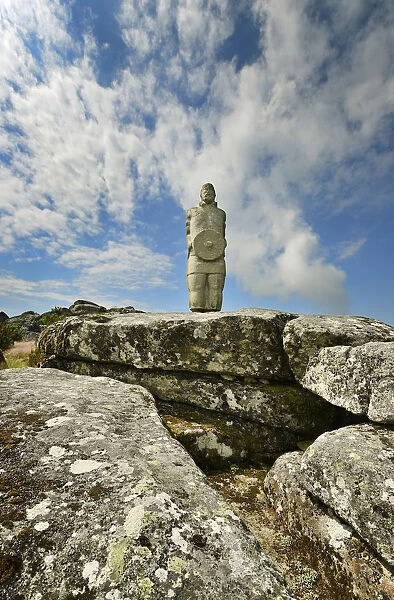 A galician-lusitanian warrior watch the horizon on the top of the Iron Age settlement