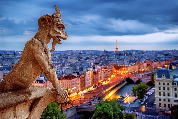 Framed Print : Gargoyle on Notre Dame Cathedral at night overlooking the city of Paris, France Framed Print : Gargoyle on Notre Dame Cathedral at night overlooking the city of Paris, France