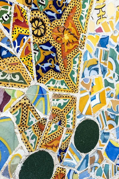 Detail of Gaudais mosaic work in the bench at Park Guell, Barcelona, Catalonia