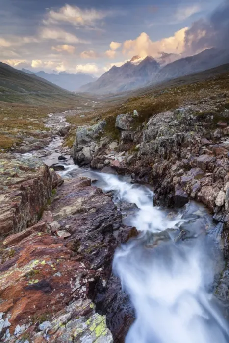 Framed Print : Gavia pass, Stelvio National park, Lombardy, Italy. Mountain river at sunset Framed Print : Gavia pass, Stelvio National park, Lombardy, Italy. Mountain river at sunset