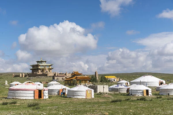 Ger camp and Tsorjiin Khureenii temple in the background. Middle Gobi province, Mongolia