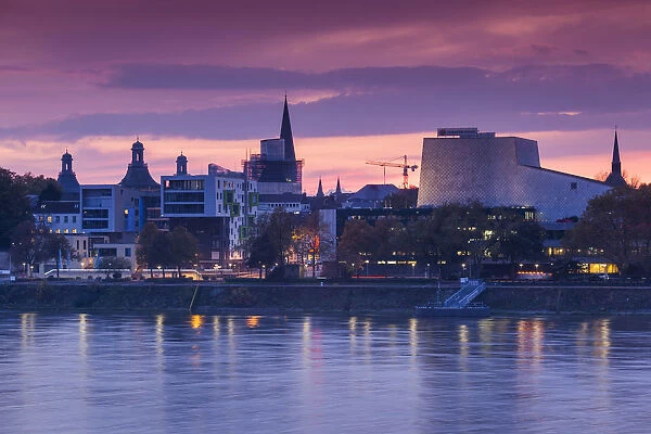 Germany, Nordrhein-Westfalen, Bonn, Rhein Riverfront and Bonn Opera building, dusk