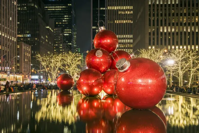 Framed Print : Giant red Christmas ornaments on display on Avenue of Americas (6th Avenue) during
