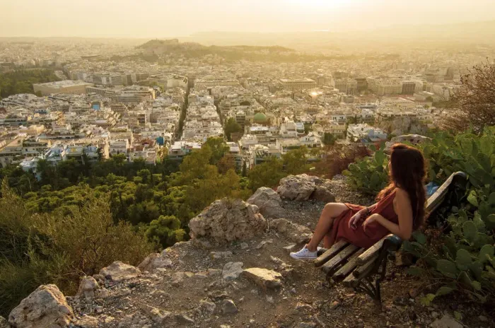 Framed Print : Girl seated on a bench at the Viewpoint of Athens at the lycabettus mount, Athens, Greece Framed Print : Girl seated on a bench at the Viewpoint of Athens at the lycabettus mount, Athens, Greece