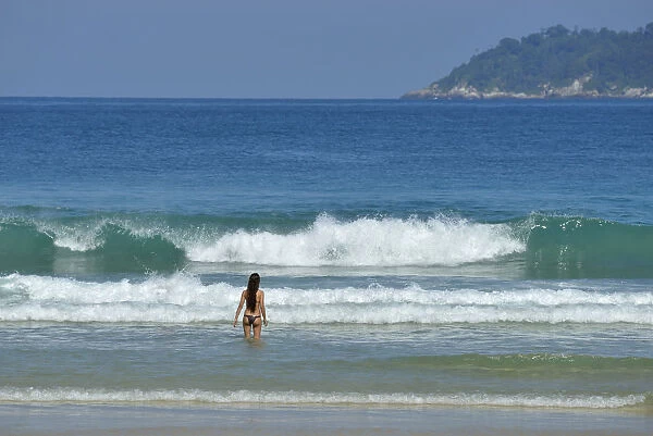 Girl in the surf, Ilha Grande, Rio de Janeiro, Brazil, South America Model release 0338