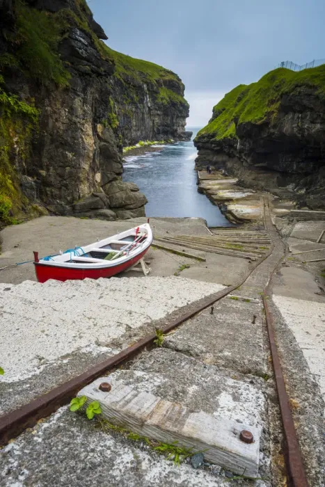 Framed Print : Gjogv, Eysturoy island, Faroe Islands, Denmark. Moored boat in the natural harbor Framed Print : Gjogv, Eysturoy island, Faroe Islands, Denmark. Moored boat in the natural harbor