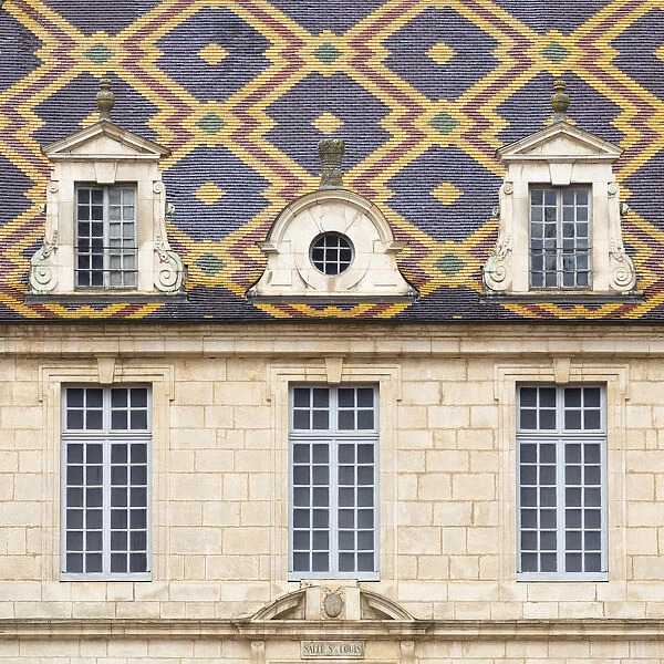 Glazed tiled roof and windows of the Hotel Dieu, Hospices, Beaune, Burgundy, France
