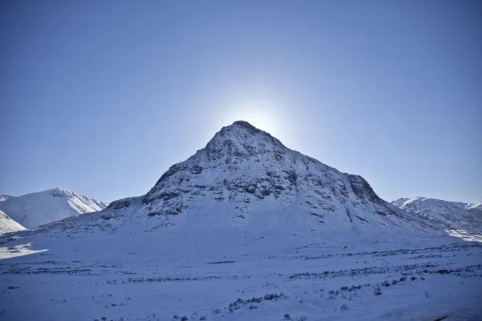 Framed Print : Glen Coe, Scotland. The sun hides behind Meall Mor in snow covered Glen Coe Framed Print : Glen Coe, Scotland. The sun hides behind Meall Mor in snow covered Glen Coe