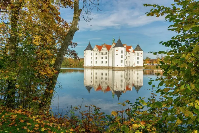 Framed Print : Glucksburg castle in autumn with reflection on Schlossteich, Glucksburg, Schleswig-Flensburg, Schleswig-Holstein, Germany Framed Print : Glucksburg castle in autumn with reflection on Schlossteich, Glucksburg, Schleswig-Flensburg, Schleswig-Holstein, Germany
