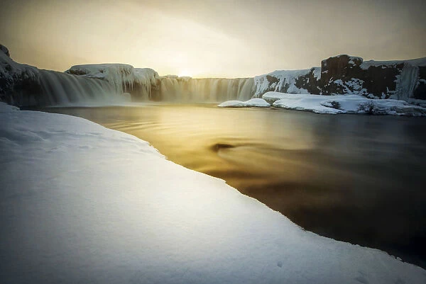 Godafoss waterfall during a cold sunset in winter, Nordurland, Iceland