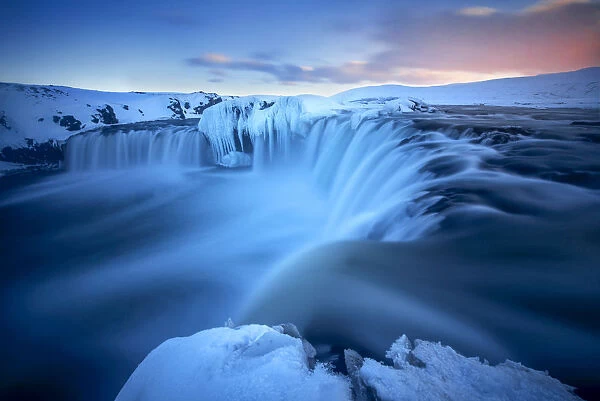 Godafoss waterfall during a cold sunset in winter, Nordurland, Iceland