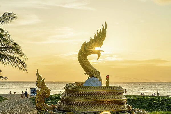 A golden dragon at sunset, Karon Beach, Phuket, Thailand
