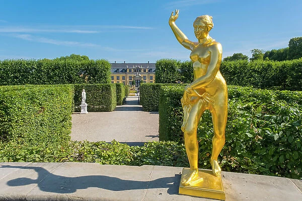 Golden statues in the gardens of Schloss Herrenhausen, Hannover, Lower Saxony, Germany