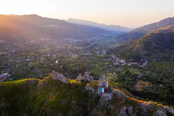 Gole dellaaAlcantara, Sicily. Aerial view of Ruffo castle ruins at sunrise with