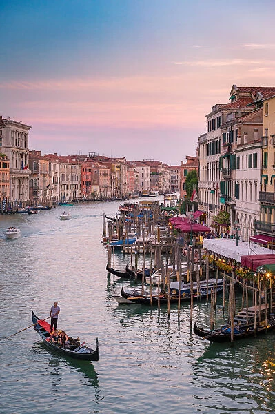 Gondola in the Grand Canal at sunset, Venice, Veneto, Italy
