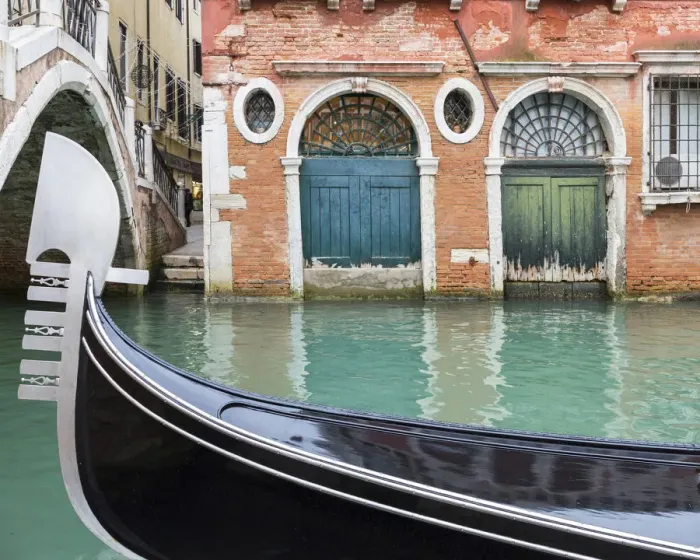 Framed Print : Gondola passes two old doors on canal, Venice, Veneto, Italy Framed Print : Gondola passes two old doors on canal, Venice, Veneto, Italy