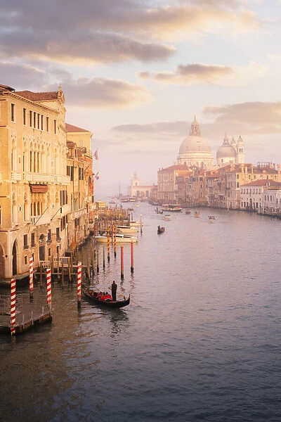 Gondola at sunset from the Accademia Bridge, Venice, Veneto, Italy