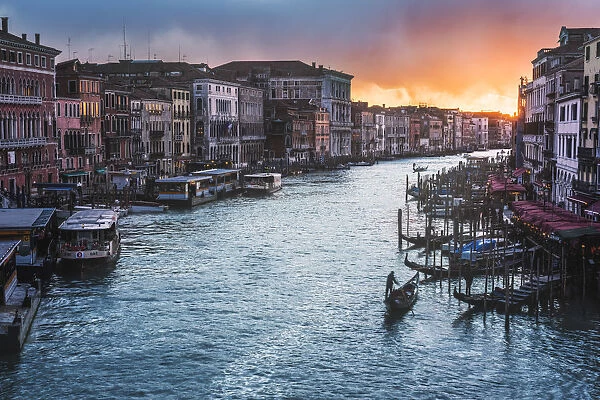 Gondolas on the Grand Canal at sunset, Venice, Veneto, Italy
