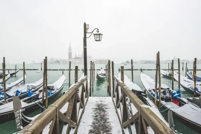 Framed Print : Gondolas with snow at St Marks waterfront, Venice, Veneto, Italy Framed Print : Gondolas with snow at St Marks waterfront, Venice, Veneto, Italy