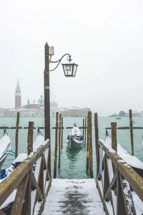 Framed Print : Gondolas with snow at St Marks waterfront, Venice, Veneto, Italy Framed Print : Gondolas with snow at St Marks waterfront, Venice, Veneto, Italy