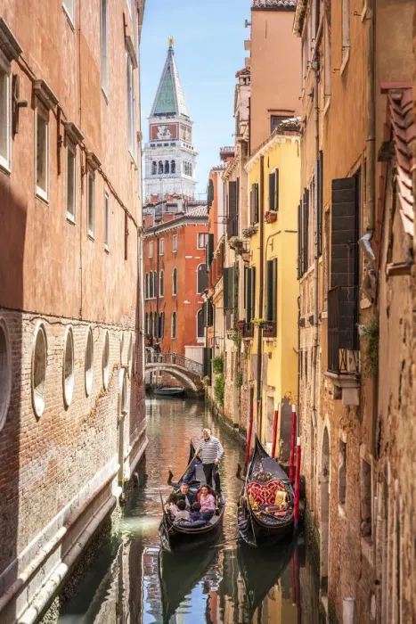 Framed Print : Gondolier and gondola in San Marco, tower on background. Venice, Veneto, Italy Framed Print : Gondolier and gondola in San Marco, tower on background. Venice, Veneto, Italy