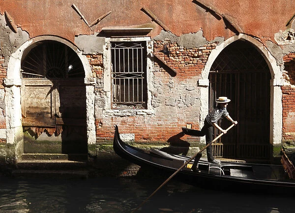 Gondolier on the Rio della Fava, Venice, Veneto, Italy