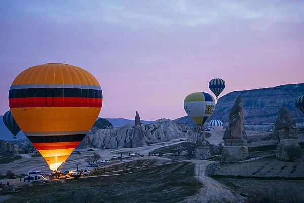 Goreme, listed as World Heritage by UNESCO, overflight of Cappadocia with multicolored