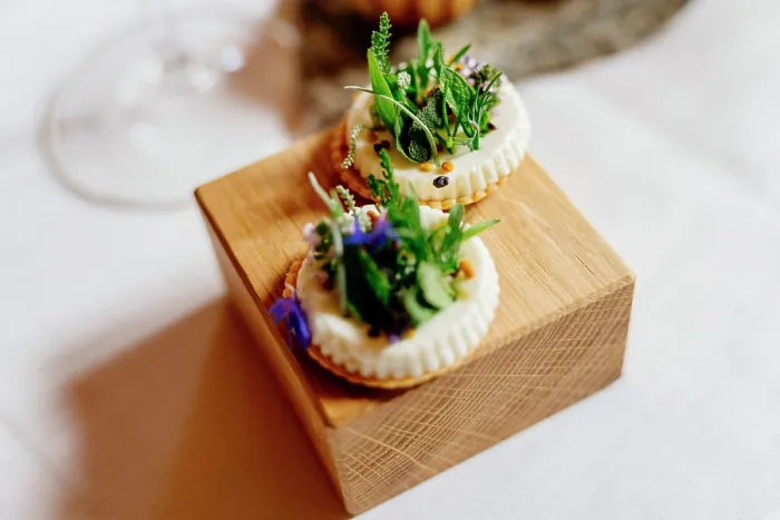 Framed Print : Gourmet appetizers with edible flowers on a wooden board, ready to be served. Trentino Alto Adige, Italy Framed Print : Gourmet appetizers with edible flowers on a wooden board, ready to be served. Trentino Alto Adige, Italy