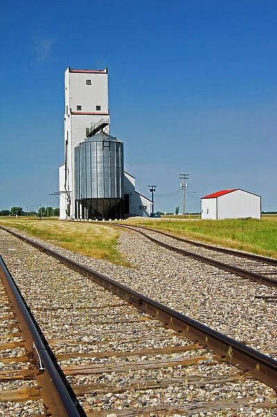 Grain elevator and railroad tracks Holland, Manitoba, Canada
