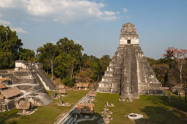 Gran Plaza, view of northern acropolis and Temple I, Tikal mayan archaeological site