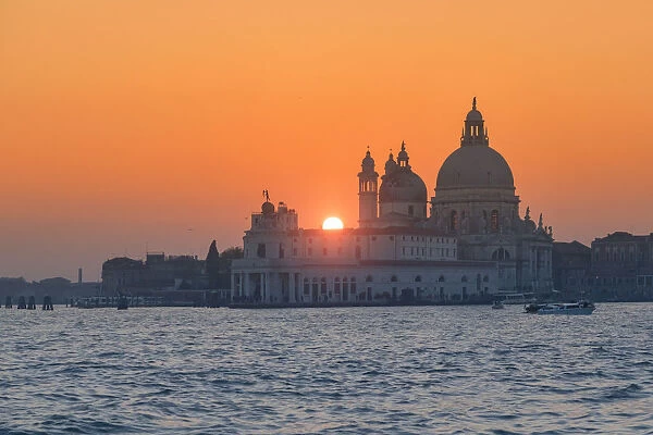 the Grand Canal at sunset with Basilica of Saint Mary of Health, Punta della Dogana