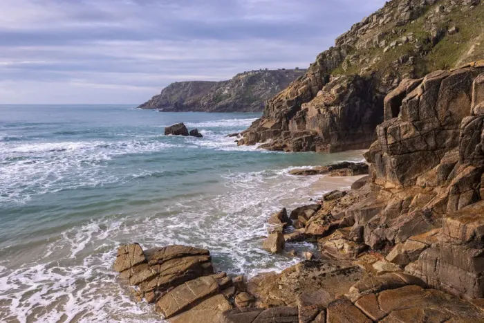 Framed Print : Granite cliffs at Pedn Vounder beach in West Cornwall, England Framed Print : Granite cliffs at Pedn Vounder beach in West Cornwall, England