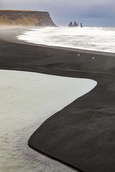 Graphic lines formed by the waves of the ocean on the beach of Reynisfjara, Vik, Sudurland
