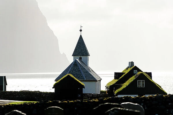 Grass roof houses and old church of Vidareidi, Vidoy Island, Faroe Islands