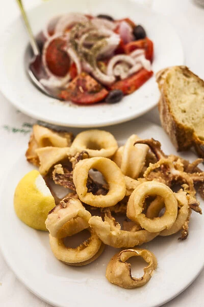 Greece, Athens, tomato and onion salad with fired calamari