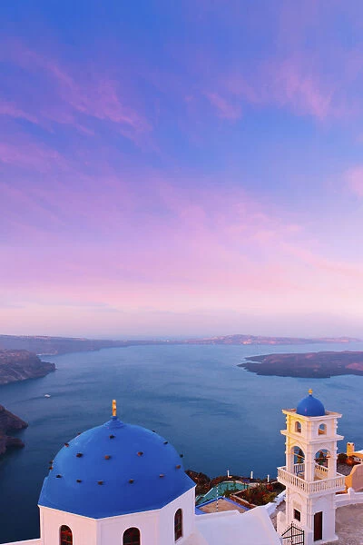Greece, The Cyclades, Santorini (Thira), Imerovigli, Church dome and bell tower at dusk