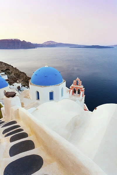 Greece, The Cyclades, Santorini (Thira), Oia, steps leading to church at dusk