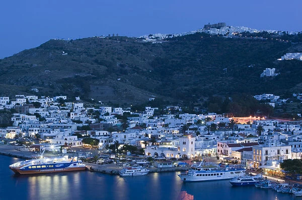 Greece, Dodecanese Islands, Patmos, Skala, View of Harbor & Hilltop Monastery of St