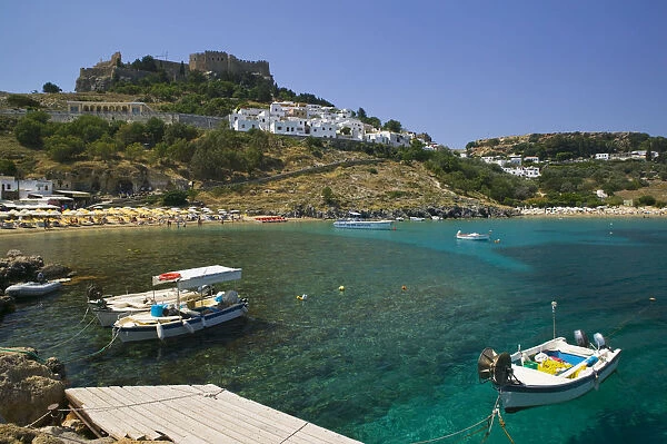 Greece, Dodecanese Islands, Rhodes, Lindos, Lindos Harbor- Beach View with Acropolis