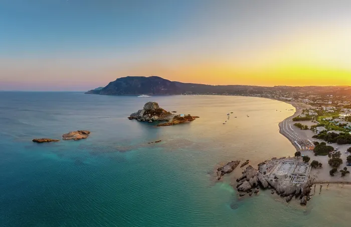 Framed Print : Greece, Dodecanese, Kos Island, Kamari Bay, Agios Stefanos Beach, Saint Stefanos Basilica Ruins and Kastri Island at sunset Framed Print : Greece, Dodecanese, Kos Island, Kamari Bay, Agios Stefanos Beach, Saint Stefanos Basilica Ruins and Kastri Island at sunset