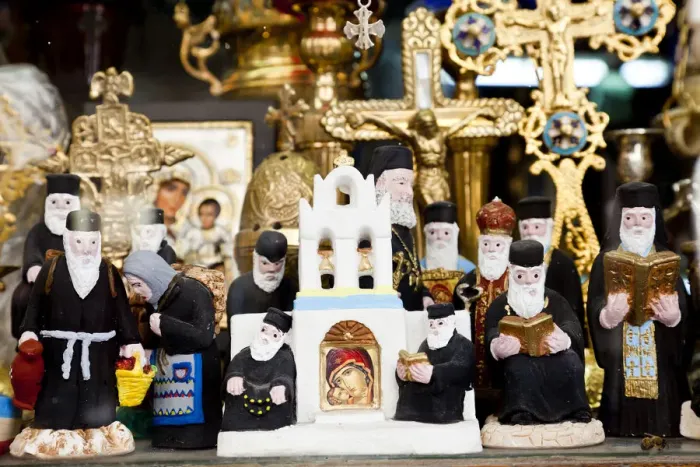 Framed Print : Greek Orthodox priest models & other orthodox icons in shop front, Athens, Greece