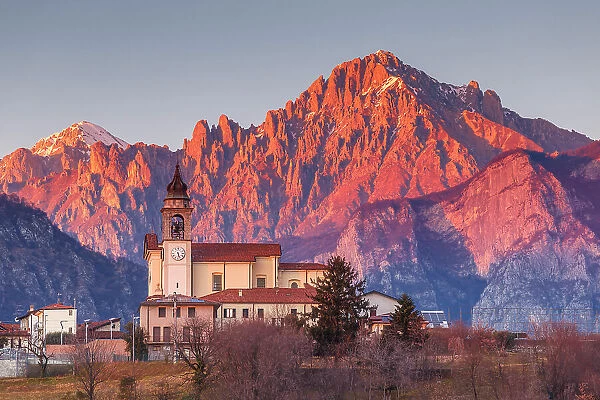 Grigna mount (Grignetta) and Civate church, Civate village, lake Annone, Brianza, Lecco province, Lombardy, Italy
