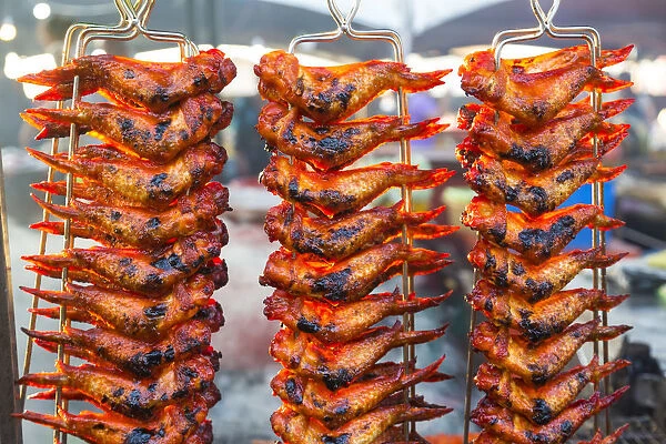 Grilling chicken wings, Night food market, Kota Kinabalu, Sabah, Borneo, Malaysia