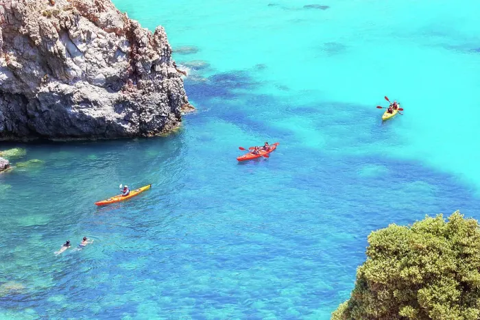 Framed Print : Group of people kayaking, Tsigrado, Milos Island, Cyclades Islands, Greece Framed Print : Group of people kayaking, Tsigrado, Milos Island, Cyclades Islands, Greece