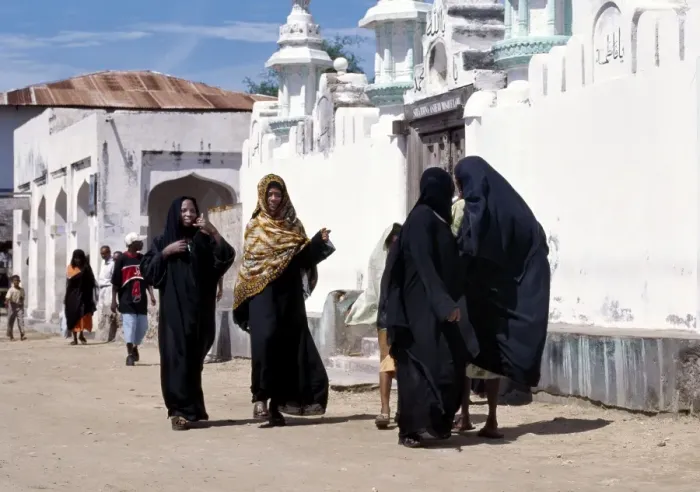Framed Print : A group of Swahili women clad in black to signify their Framed Print : A group of Swahili women clad in black to signify their
