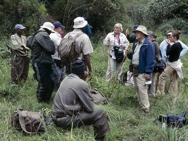 A group of tourists is briefed by parks staff of the