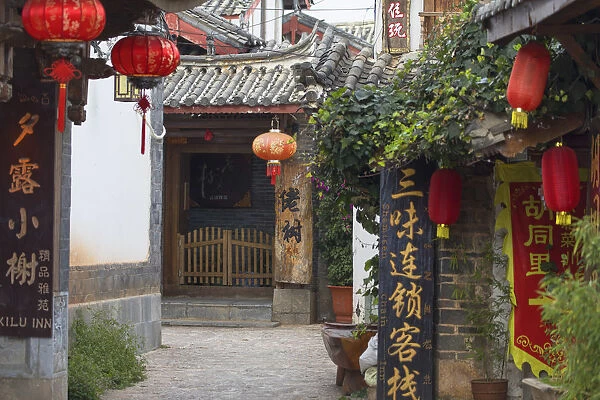 Guesthouses in alleyway, Lijiang (UNESCO World Heritage Site), Yunnan, China